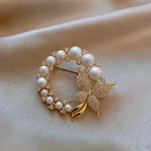 Rhinestone-Encrusted Butterfly Brooch With Synthetic Pearls