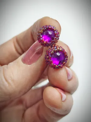 Shiny reddish purple beaded stud earrings