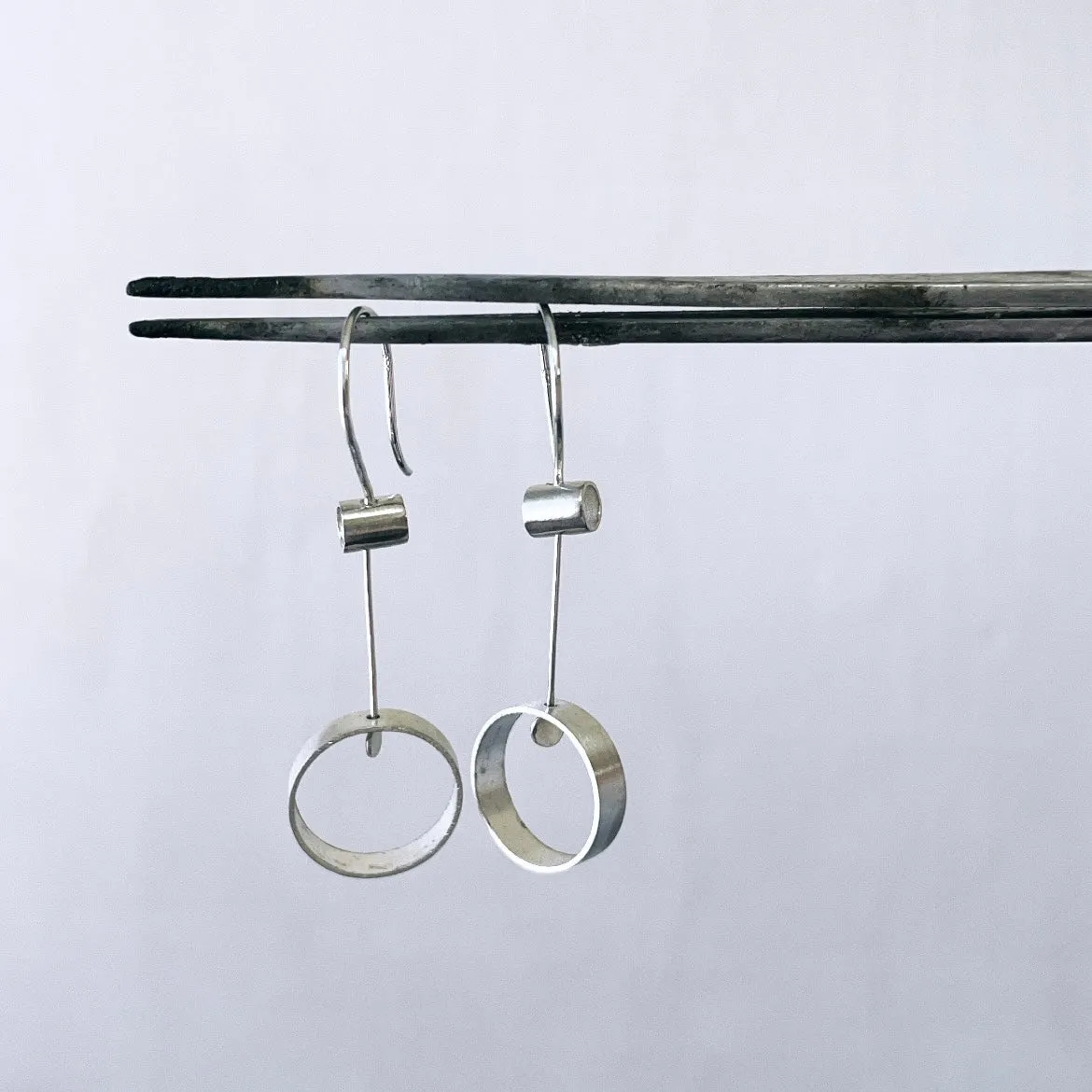 Tube pivot earrings